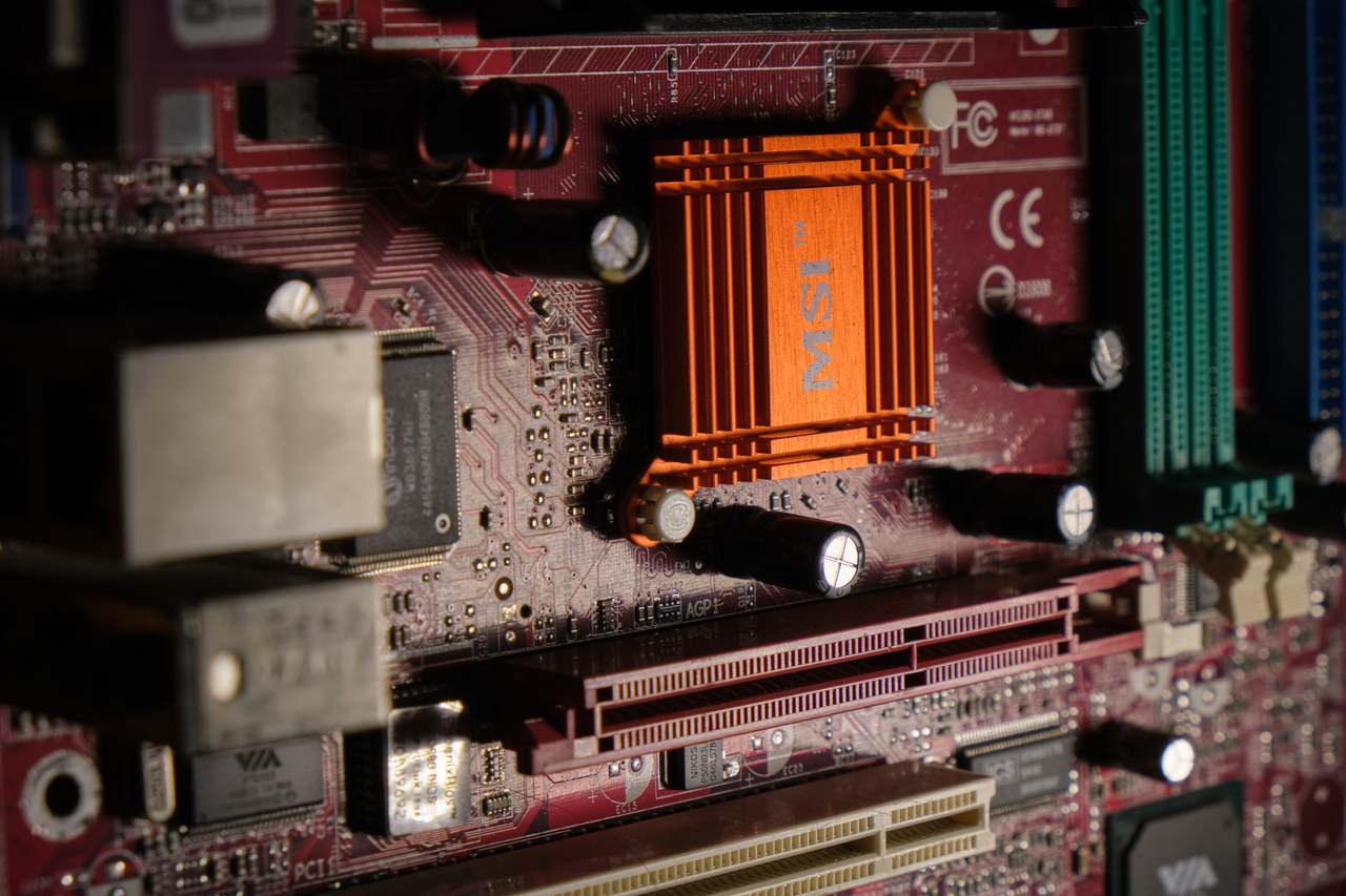 The Art of Drawing Readers In: Your attractive post title goes here Detailed view of a computer motherboard showcasing intricate electronic components.